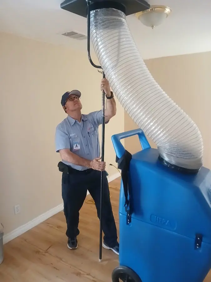 HVAC Installation technician using HEPA equipment in Lighthouse Point